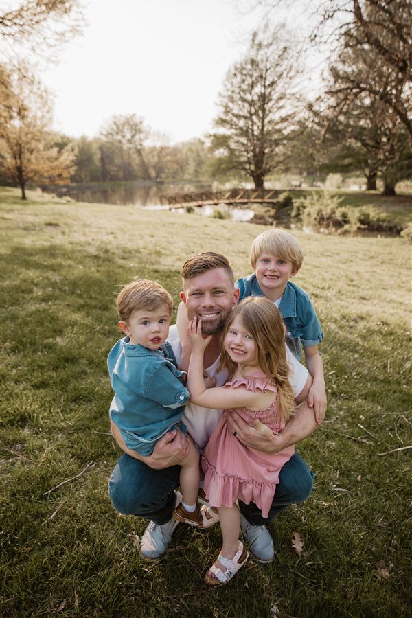 Zach Axelson, owner of Axelson Construction, with his kids