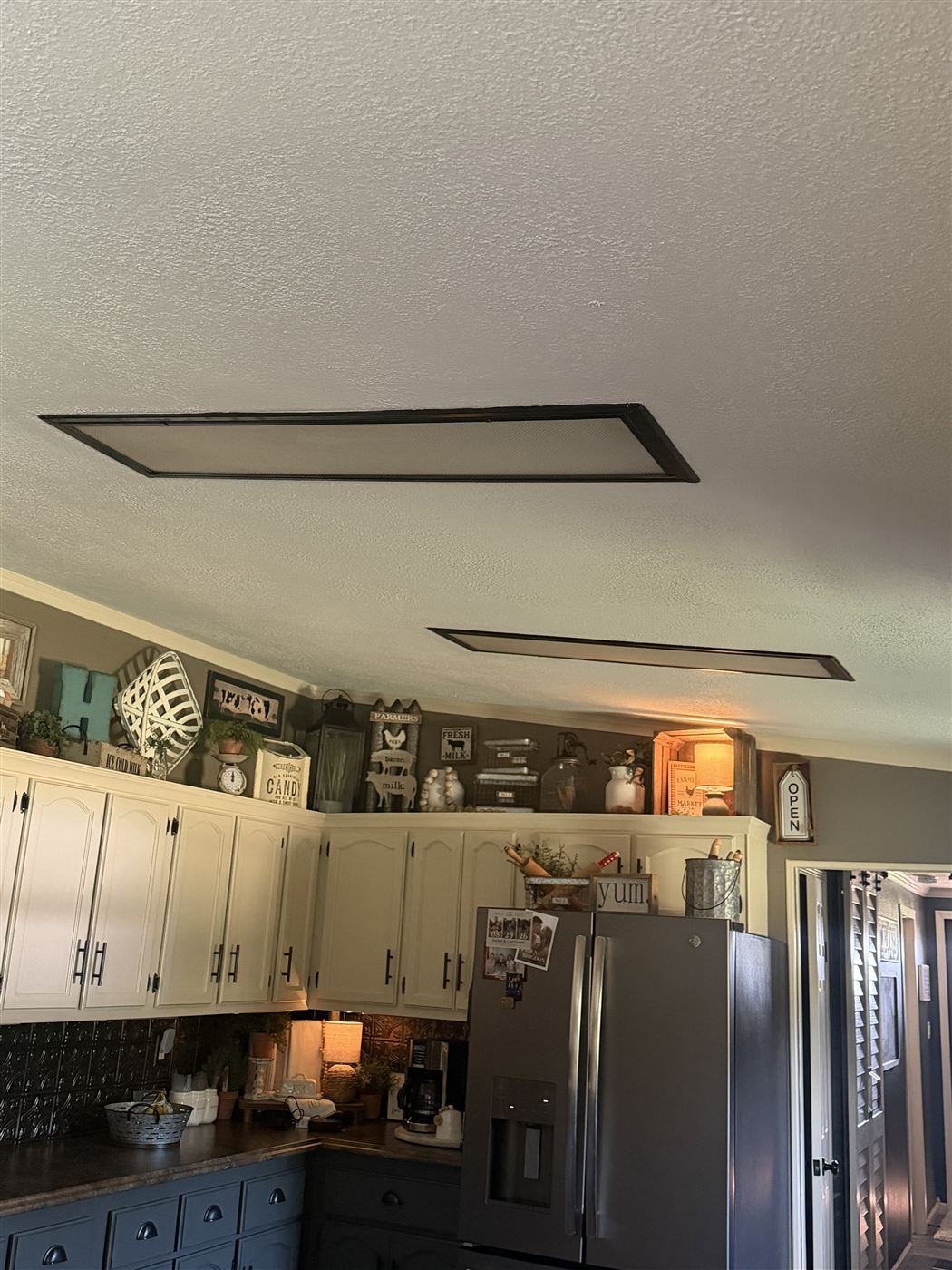 Original textured ceiling with two recessed fluorescent light panels