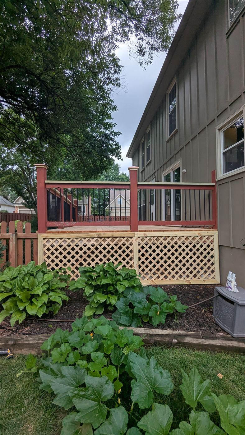 Recently rebuilt deck with lattice skirting in Overland Park, KS