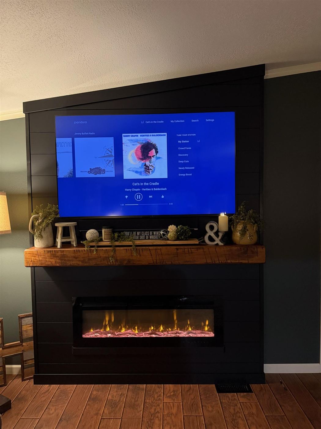 Finished custom media wall with electric fireplace, after photo