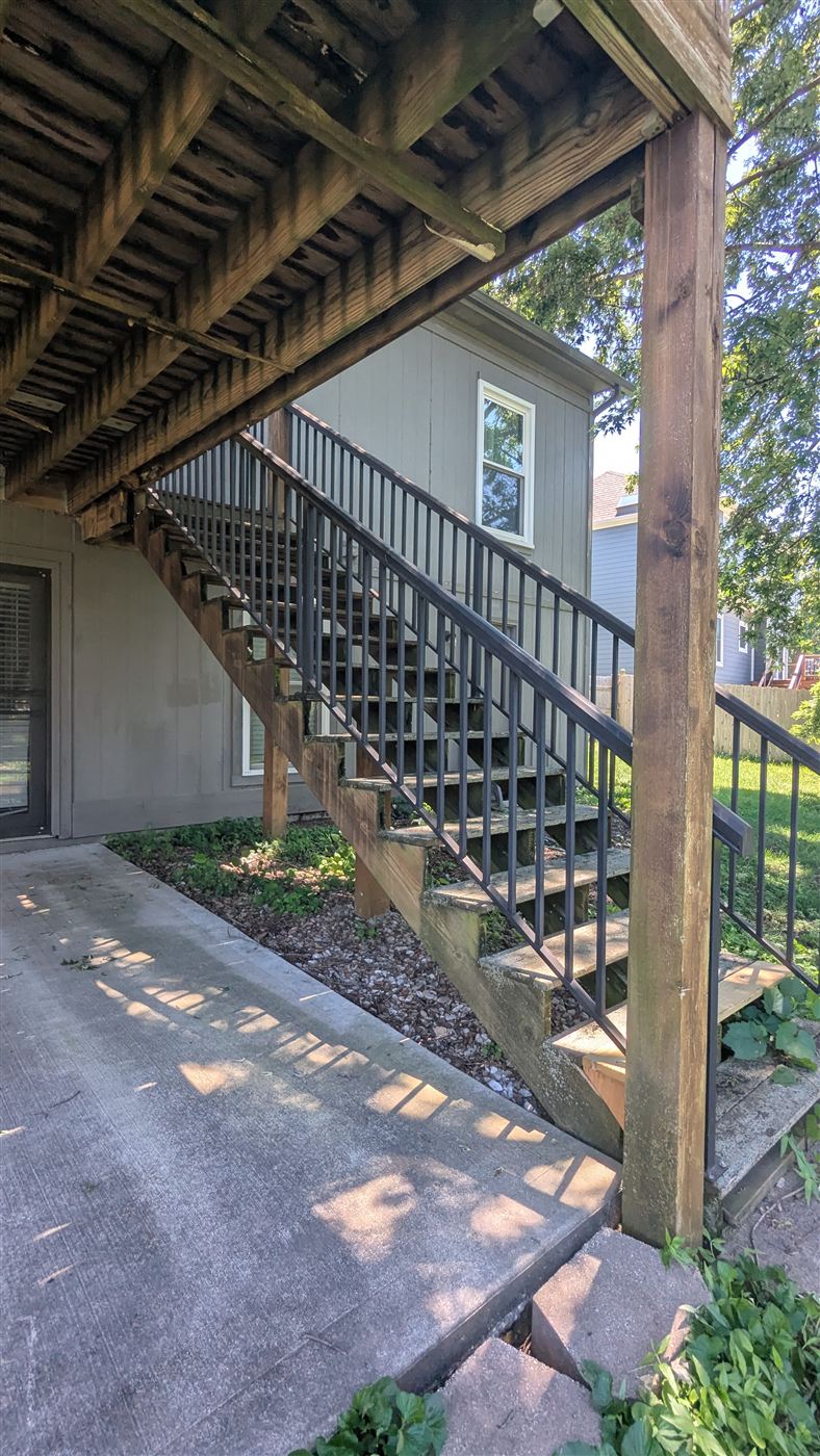 Old worn deck stairs before rebuild